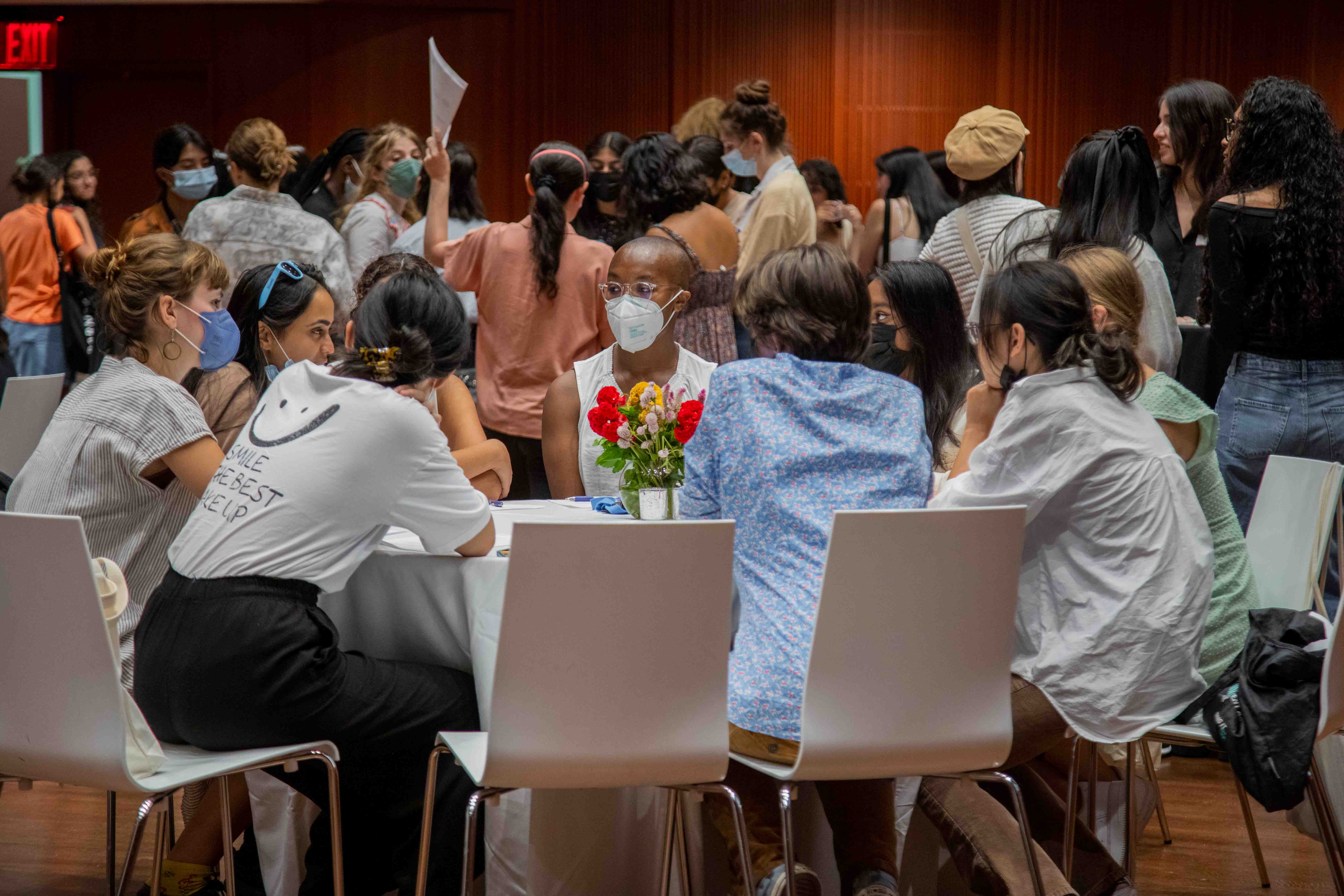 Group of students at large event table