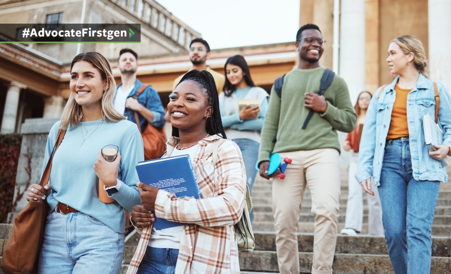 a group of 8 students walk down stairs leading away from a campus building. The group is smiling, interacting, and holding books and bags.