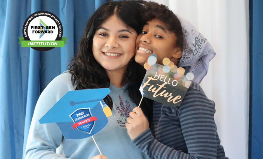 Two Catawba College first-gen students at a photobooth
