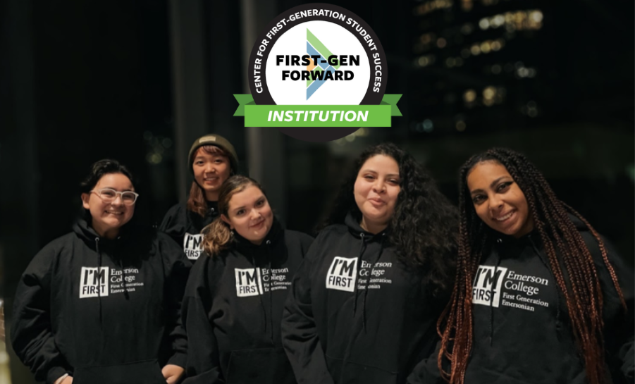 Six students wearing black sweaters with I'm First logo