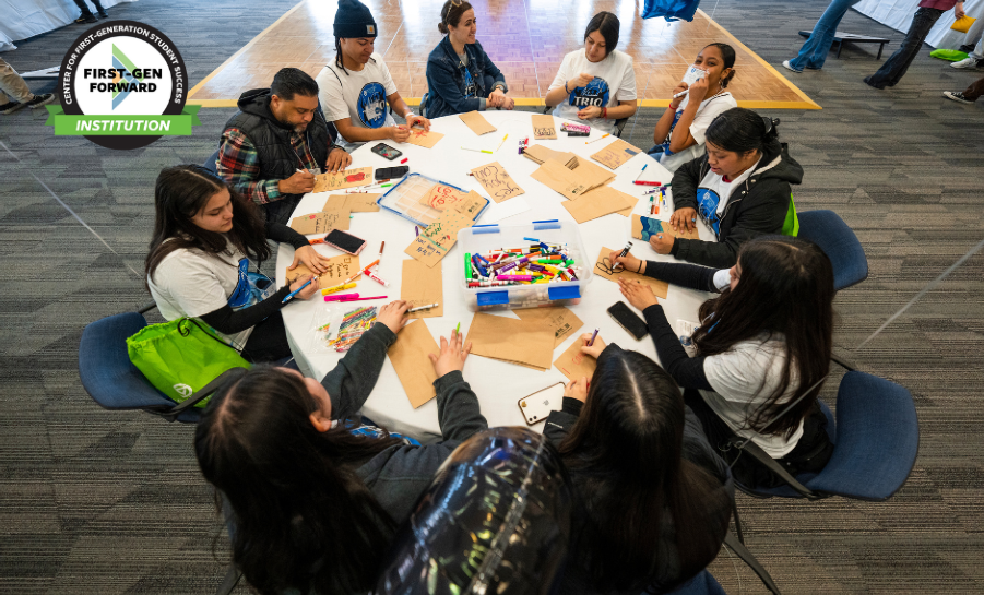 Group of Grand Valley State University students at round table