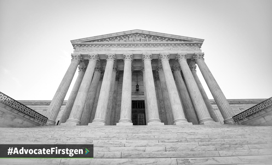 Greyscale photo taken from the perspective of someone looking up at the Supreme Court's facade