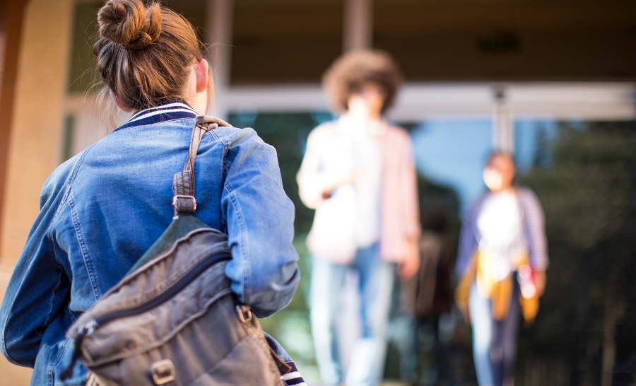 Female Student Walking on Campus