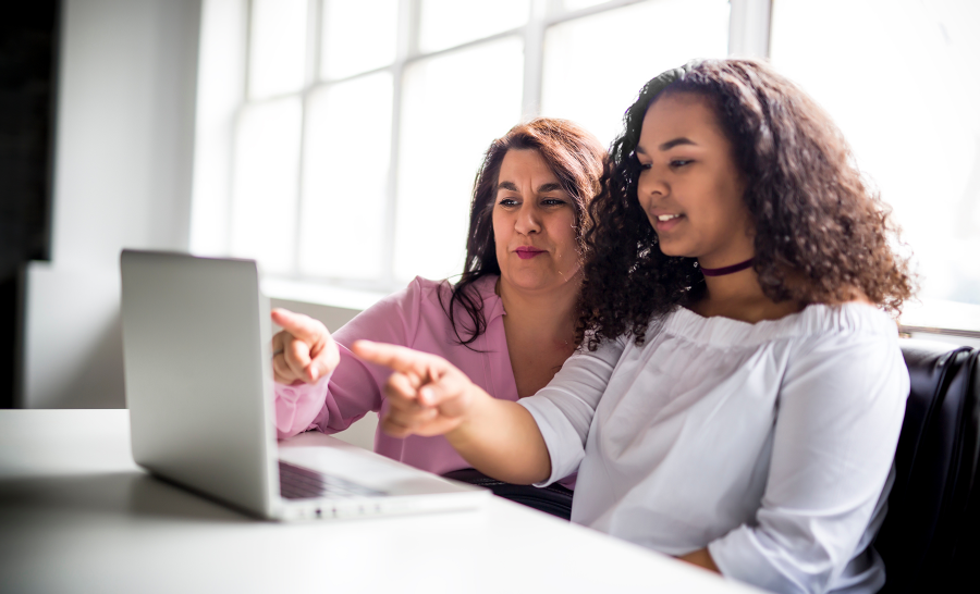 Female Student with Parent at the Computer