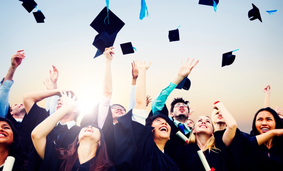 Graduates Tossing Caps