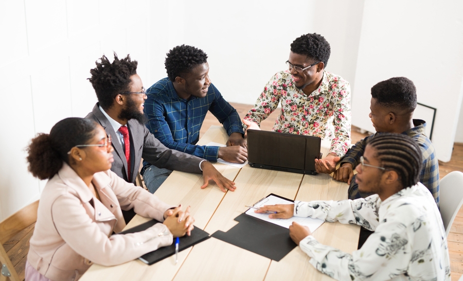 Group of Black People Working at a Table