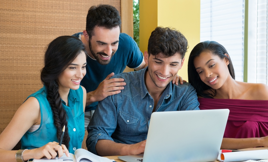 Happy Latin Family at Laptop