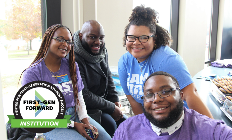 Group of first-gen advocates in purple shirts smiling and posing
