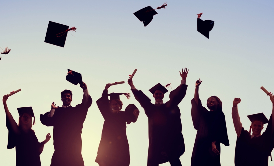 Students Graduating Tossing Caps