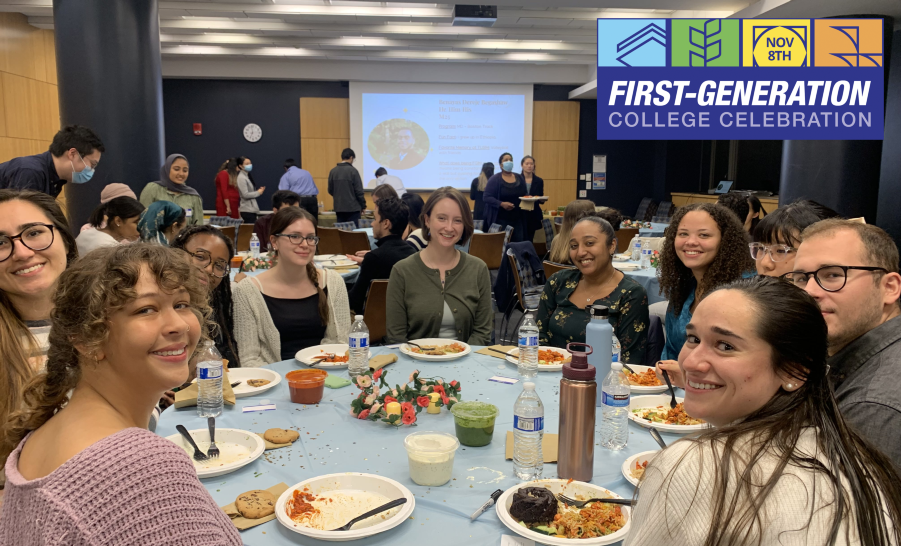 Students sitting around a table eating dinner awaiting a keynote speaker for their celebration day event