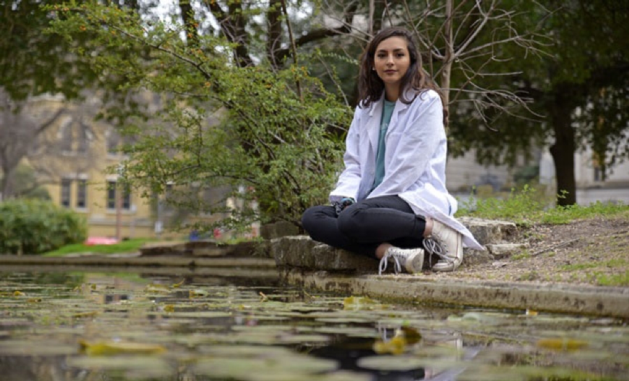 UT student by water