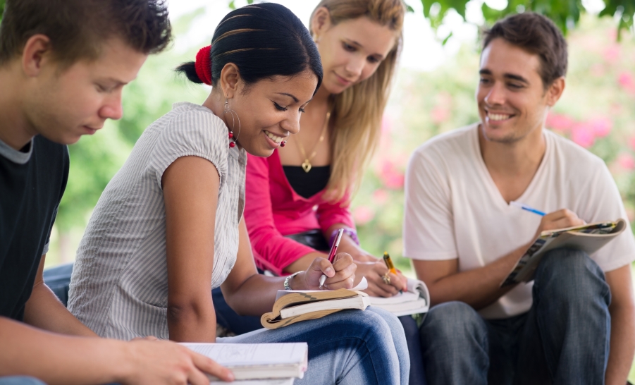 group of students with notebooks