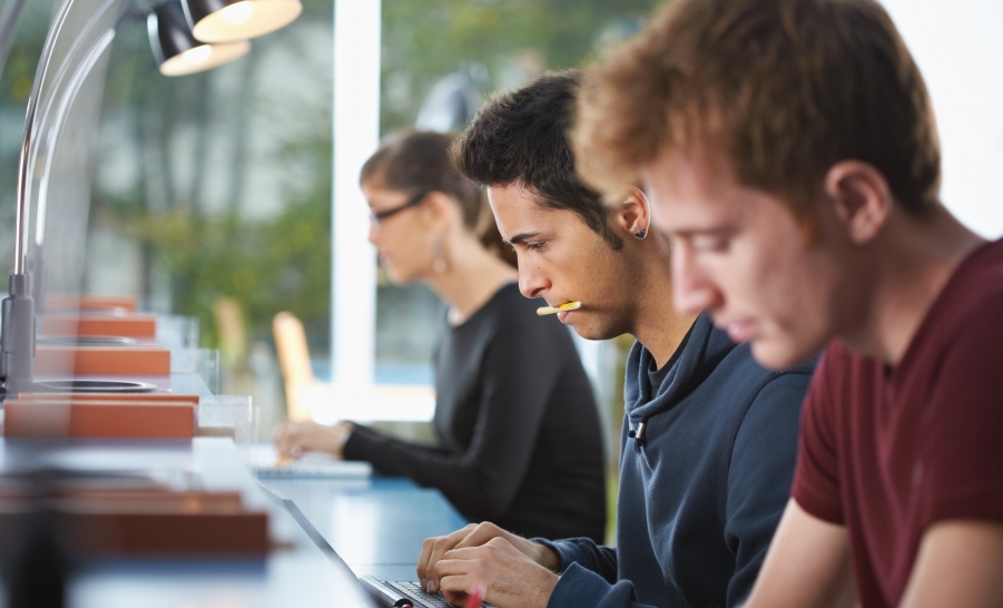 male student at desk