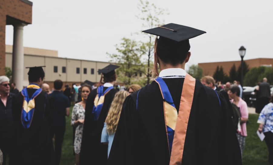 male student at graduation