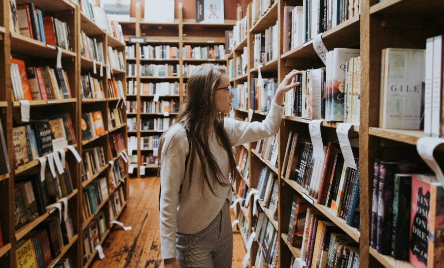 young woman in library