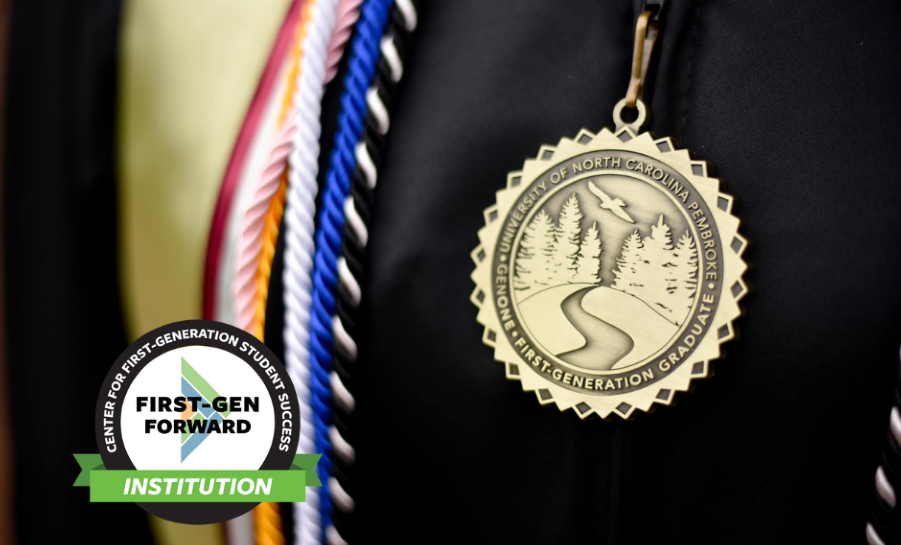 First-generation student medallion over a graduate gown