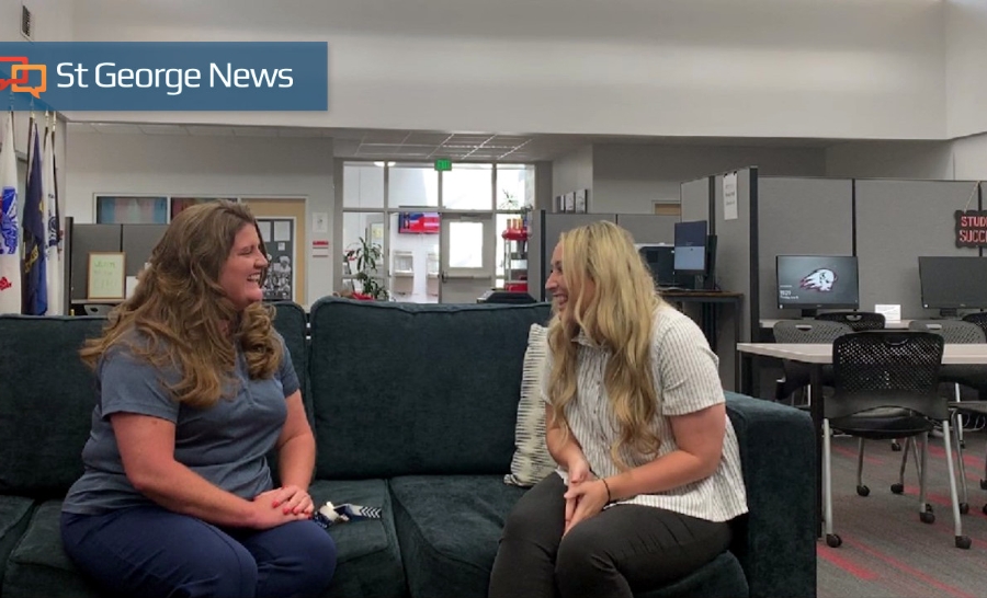 two people talking in the first-gen student services office