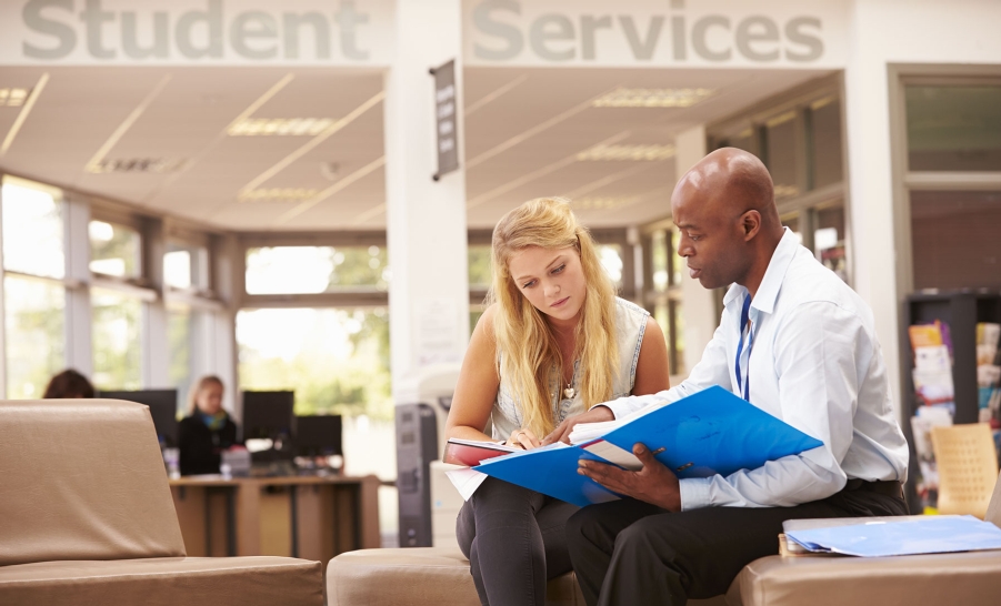 mentor helping female student